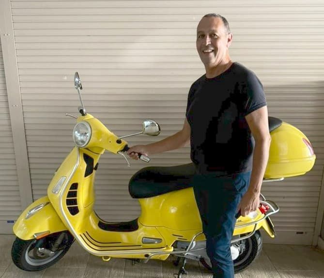 Walter with the yellow delivery scooter